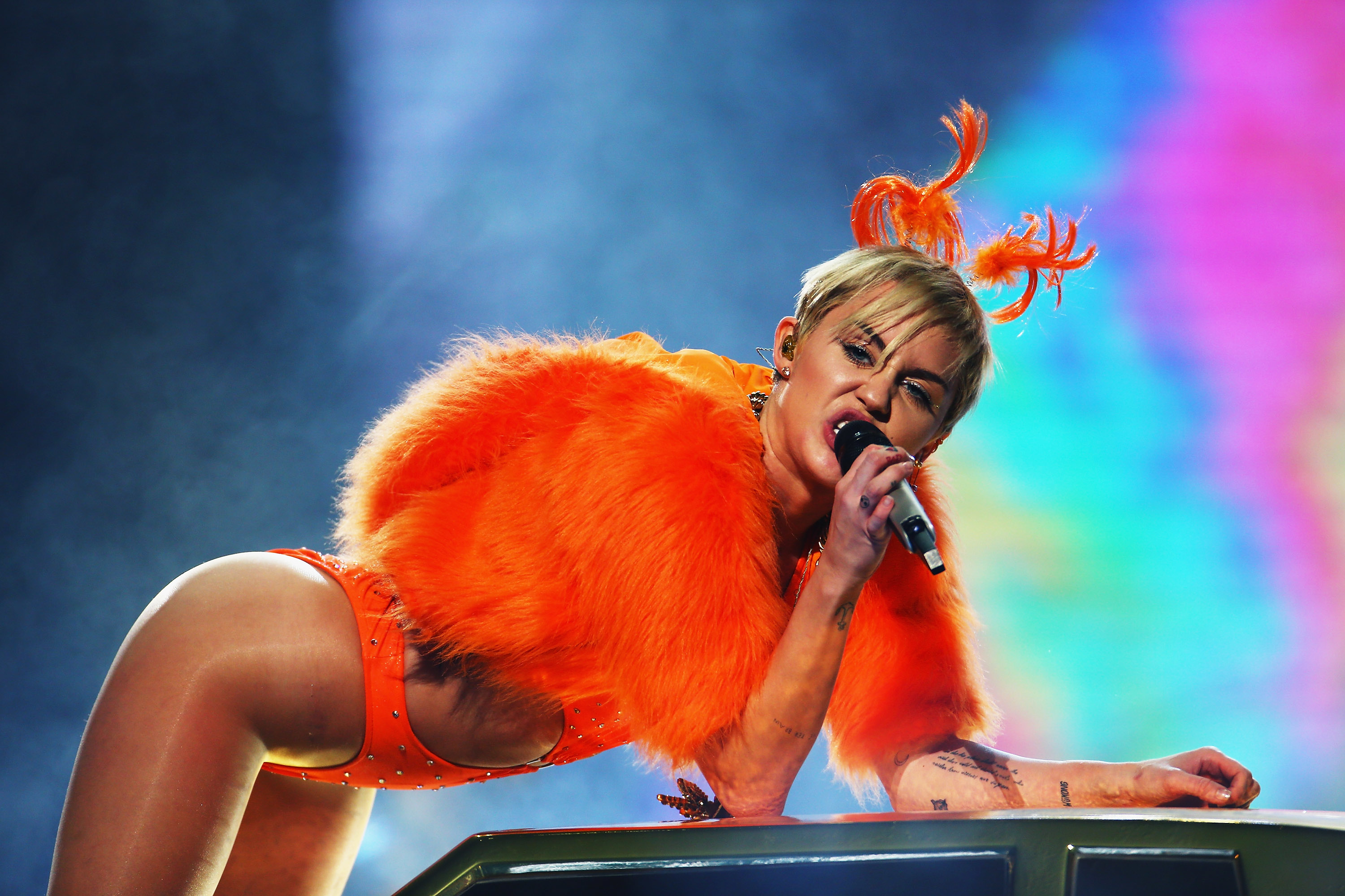 Miley performing onstage
