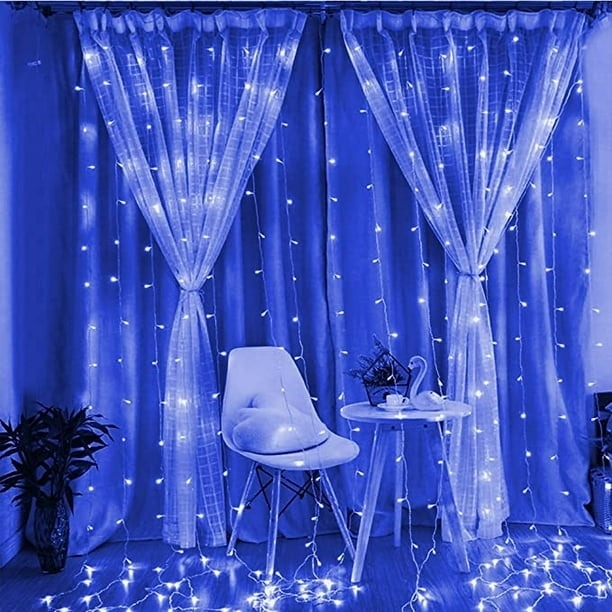 a curtain of twinkly blue lights hanging
