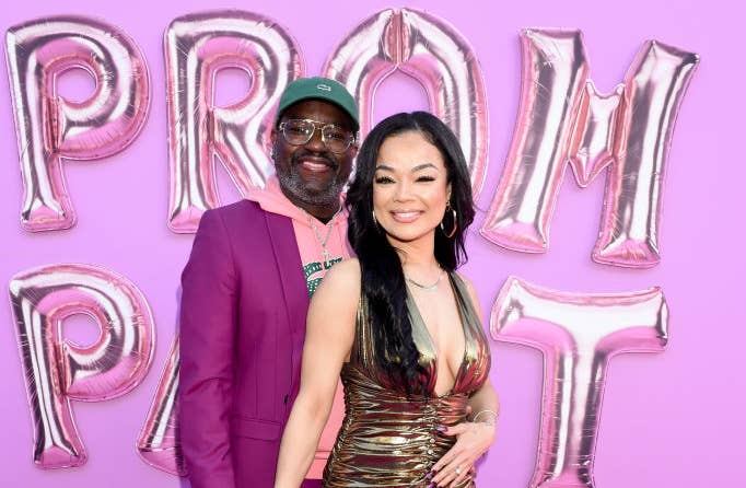 Closeup of Lil Rel with his arm around Dannella at an event
