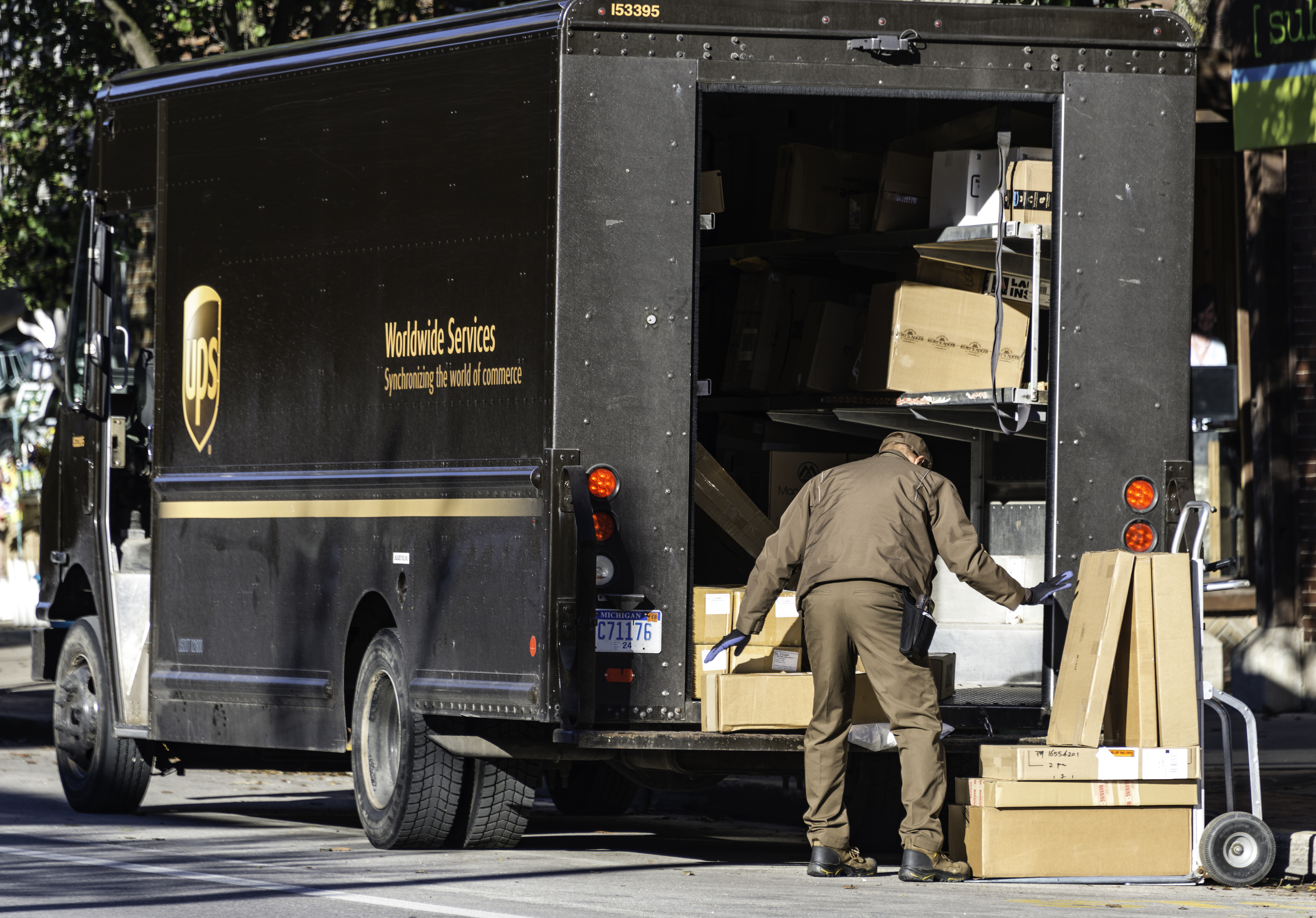 UPS driver making deliveries