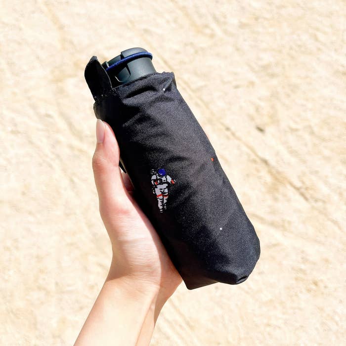 LOFT（ロフト）のオススメの雑貨「晴雨兼用折りたたみ傘 スマートデュオ フリー アストロノーツ ハス」