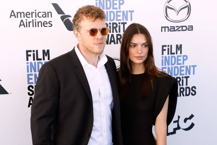 Sebastian and Emily pose for photographers on the red carpet