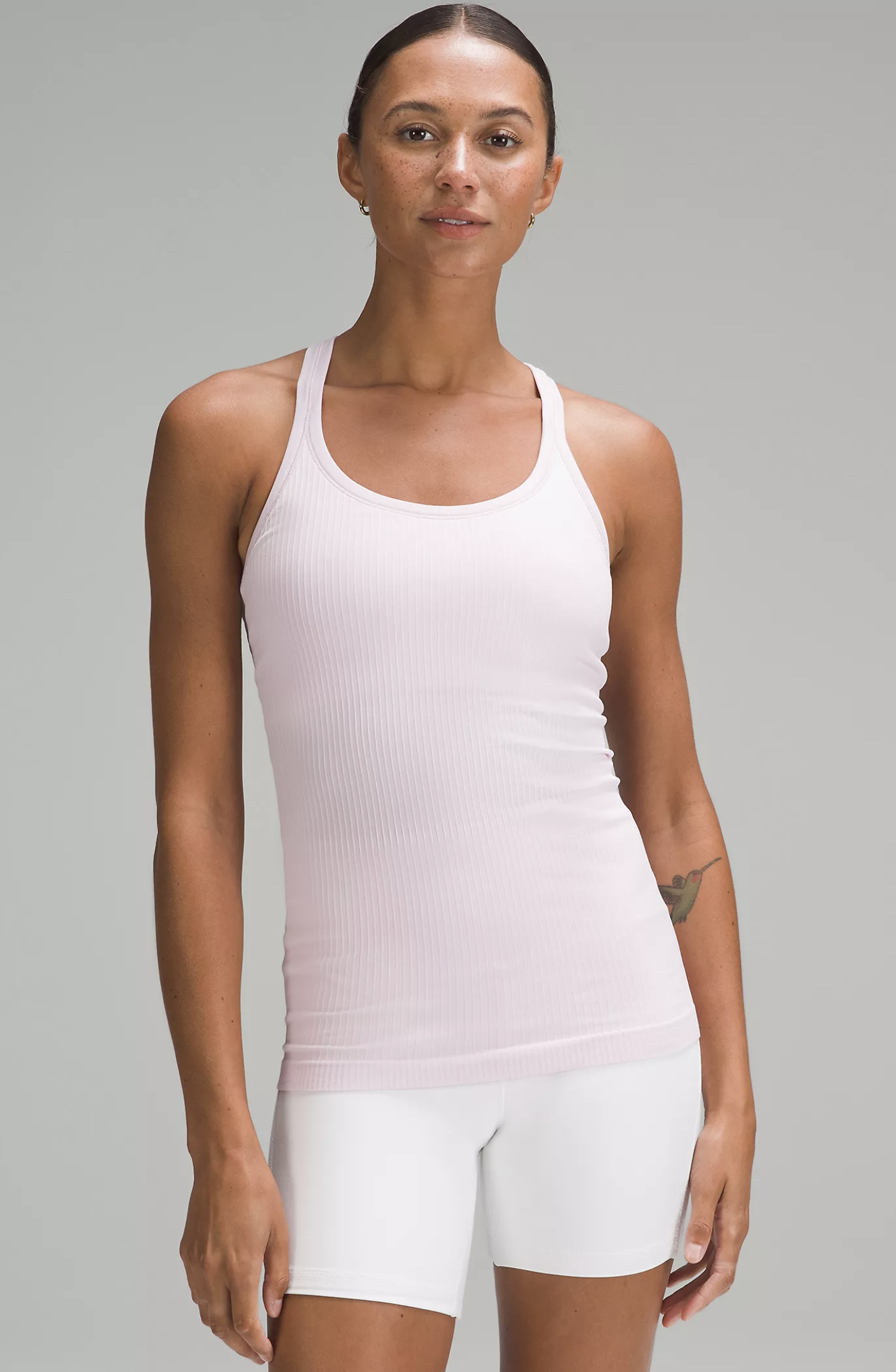 front view of model wearing the tank top in pink