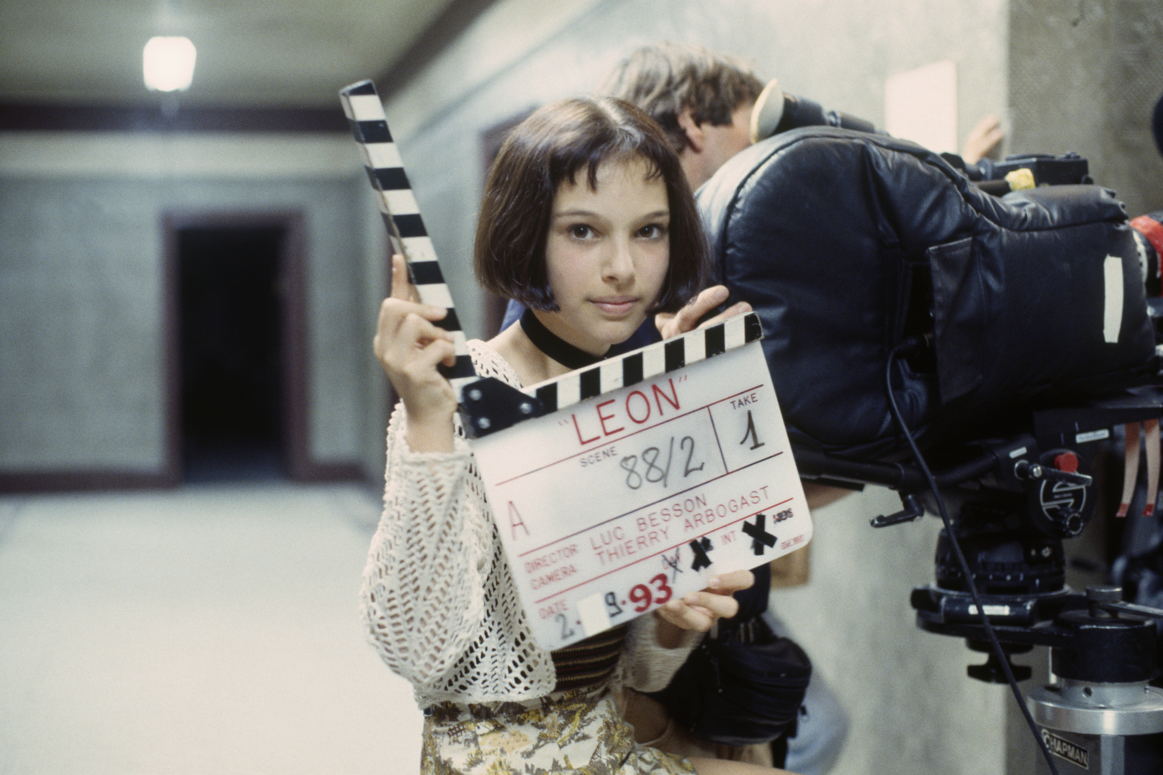 Natalie Portman on the set of Leon holding a clapper