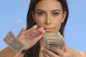 Kim Kardashian throwing money