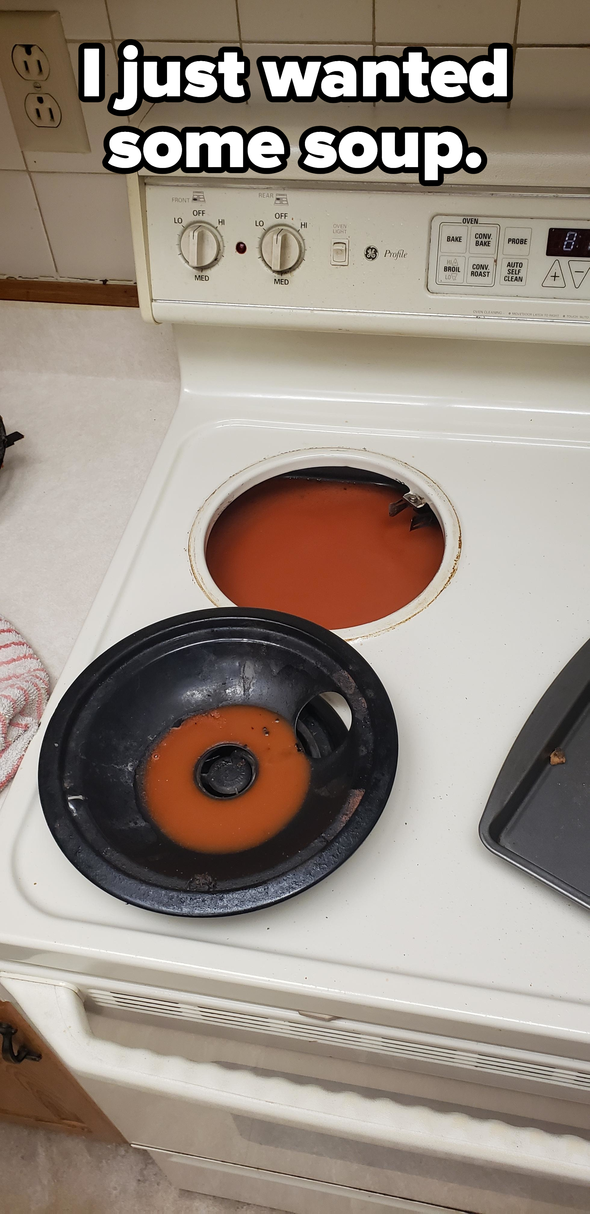 Soup that&#x27;s spilled all over and into a stove top burner with caption &quot;I just wanted some soup&quot;