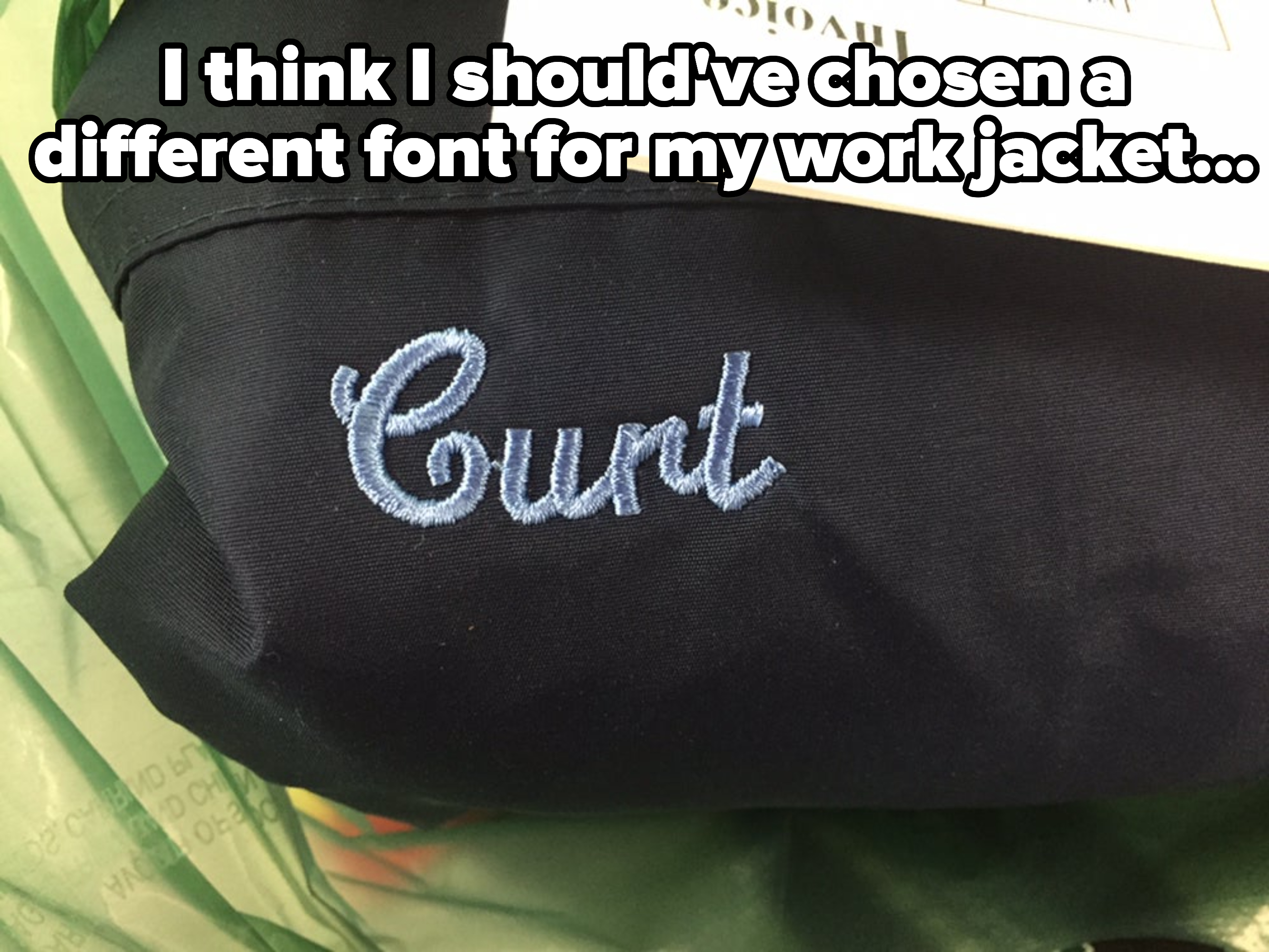 Close-up of a work jacket with a name that&#x27;s supposed to be &quot;Curt&quot; but looks like the c-word, with caption &quot;I think I should&#x27;ve chosen a different font for my work jacket&quot;