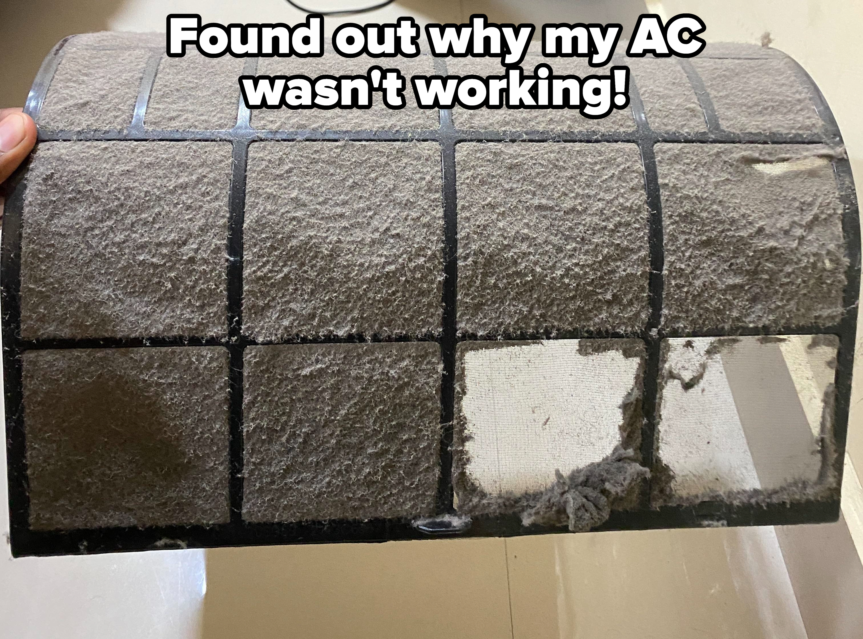 An extremely dirty air conditioner filter, with caption &quot;Found out why my AC wasn&#x27;t working!&quot;