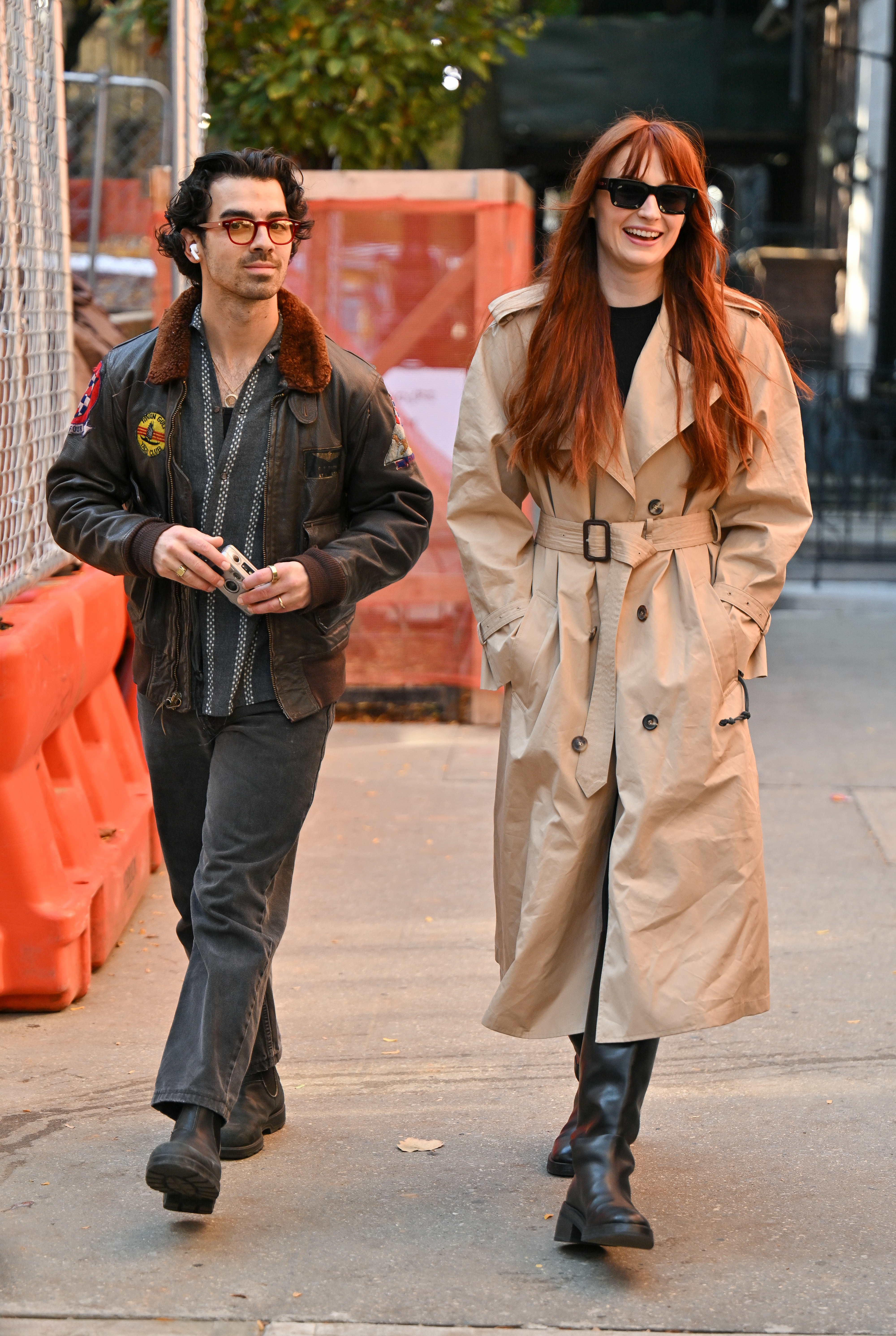 Joe and Sophie walking together on the street