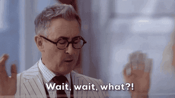 Alan Cumming as Dr. Dylan Reinhart from the show &quot;Instinct&quot; is saying, &quot;Wait, wait, what?!&quot;