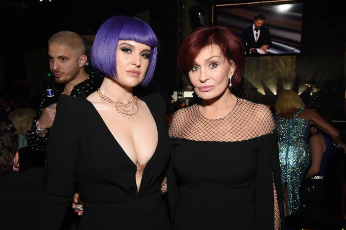 Close-up of Sharon and Kelly Osbourne dressed in black at a media event