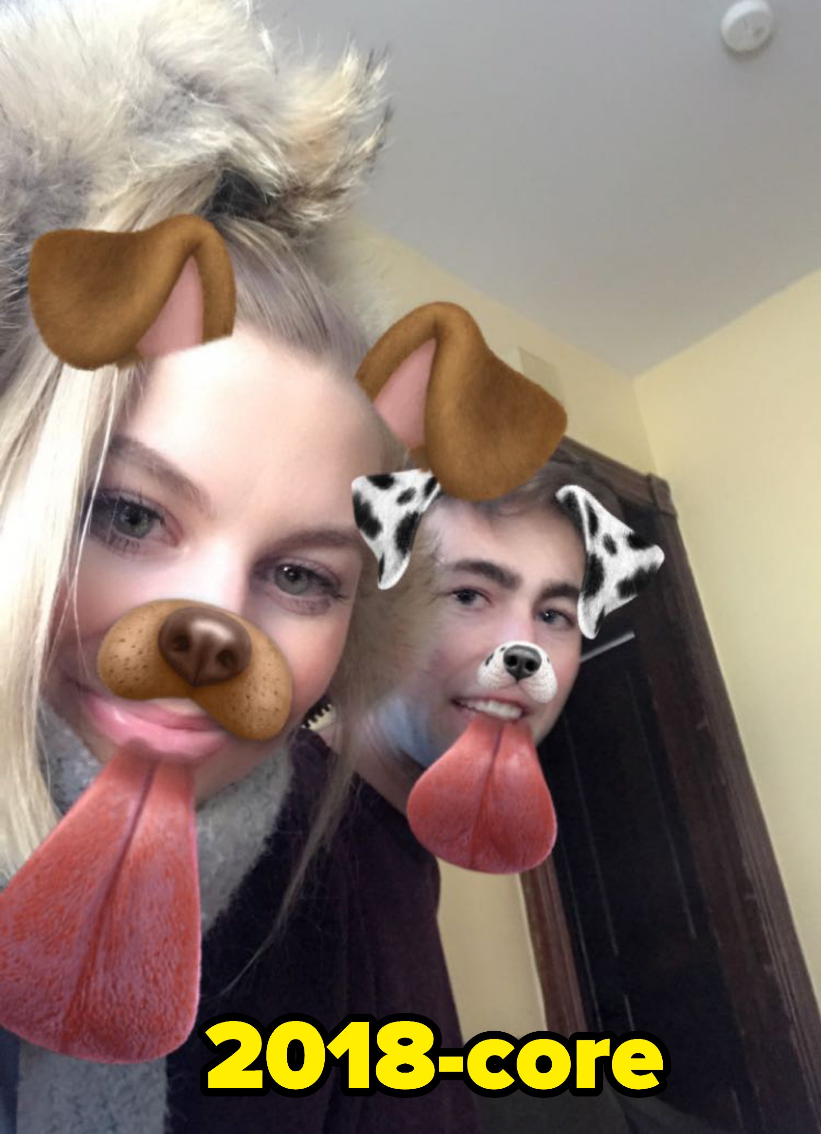My boyfriend and me with the Snapchat dog filter on our faces in 2018