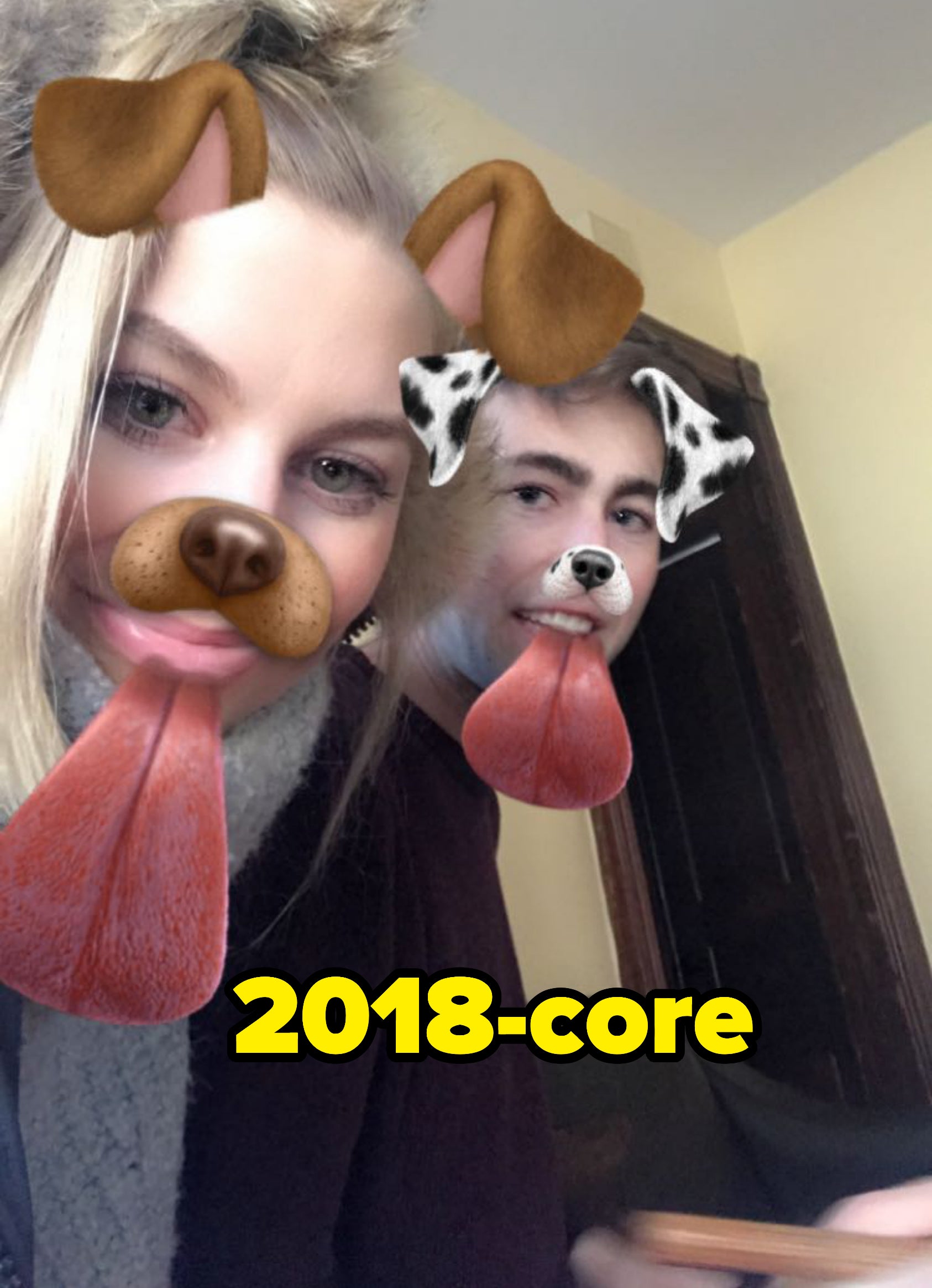 My boyfriend and me with the Snapchat dog filter on our faces in 2018