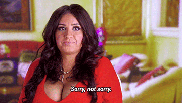 Woman on reality TV saying "sorry, not sorry"