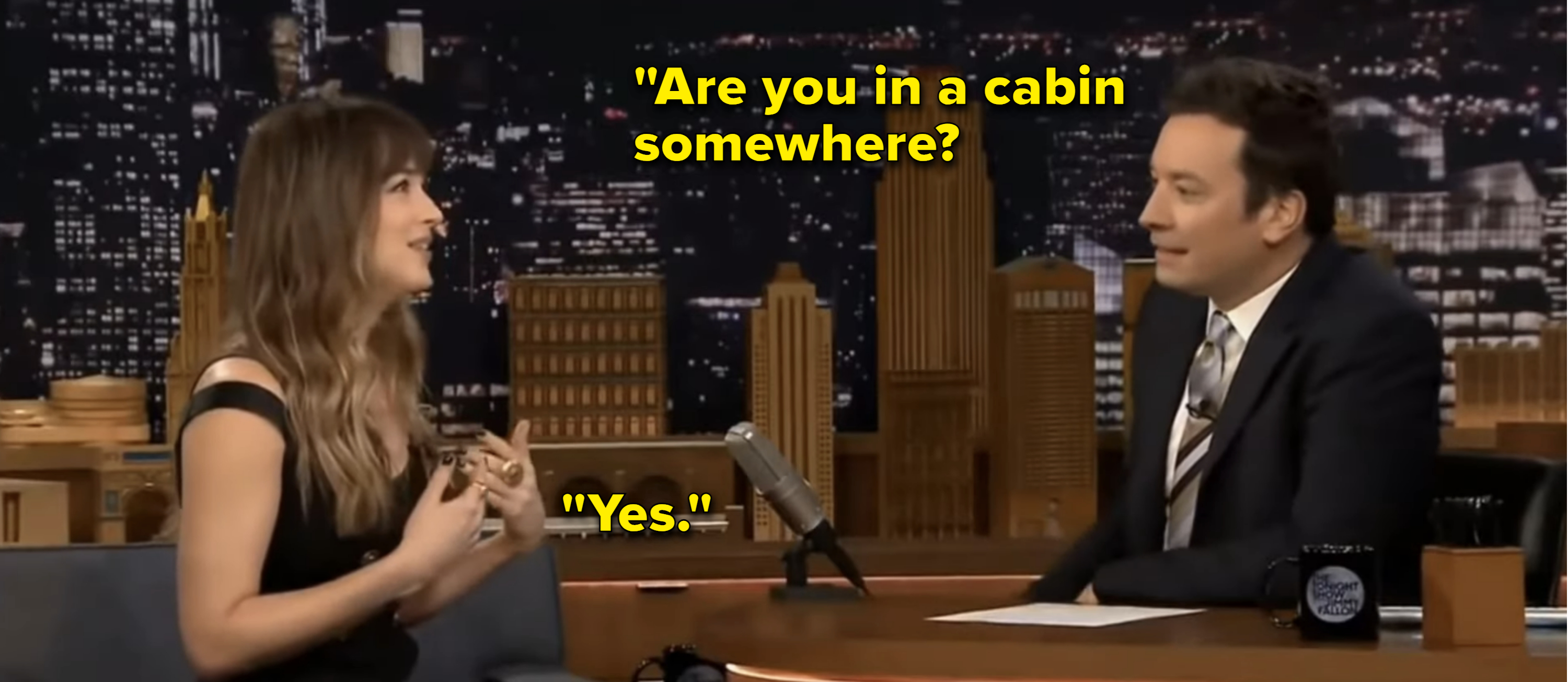 Jimmy asks Dakota Johnson &quot;Are you in a cabin somewhere?&quot; to which she replies &quot;Yes&quot;