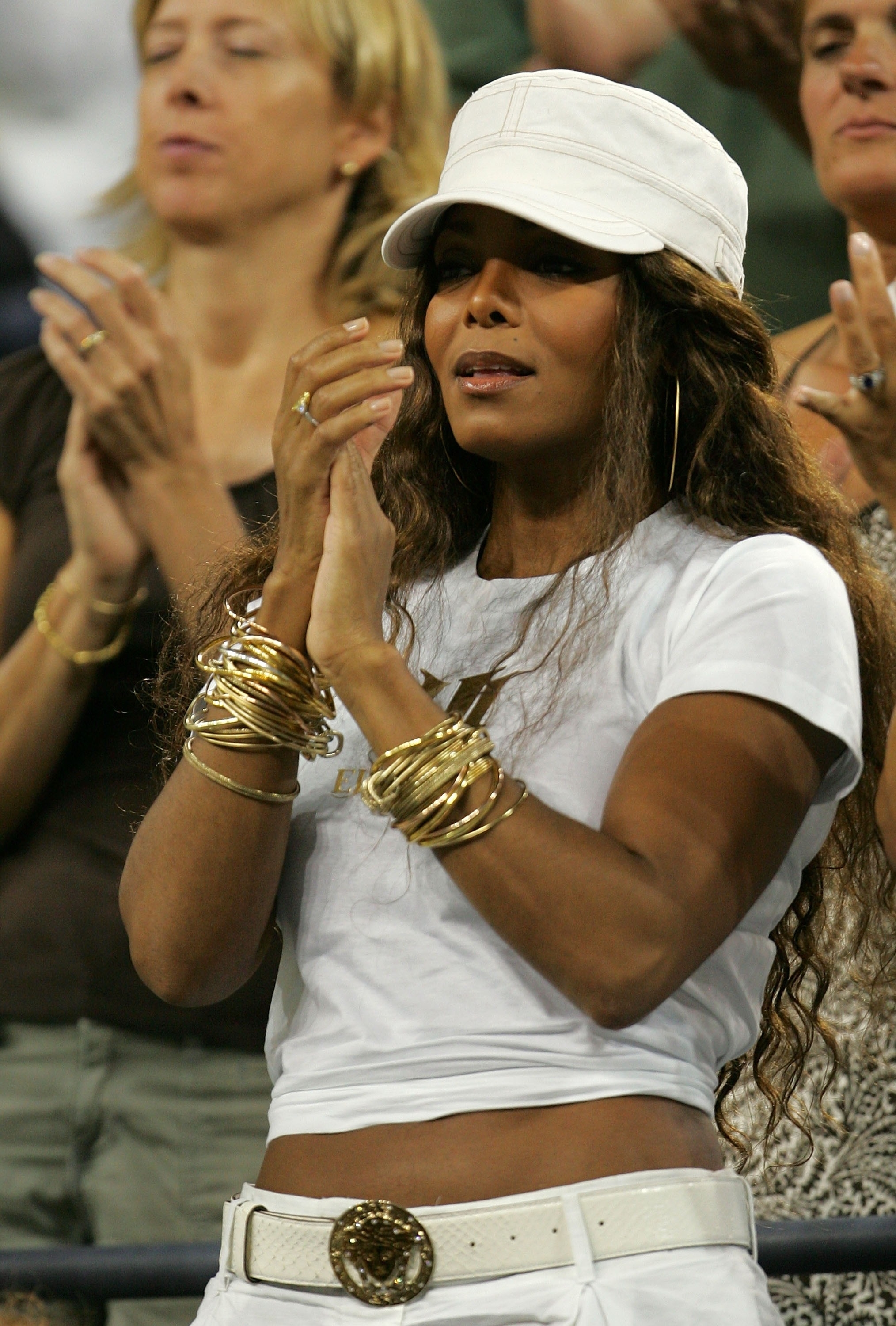Janet Jackson standing and applauding