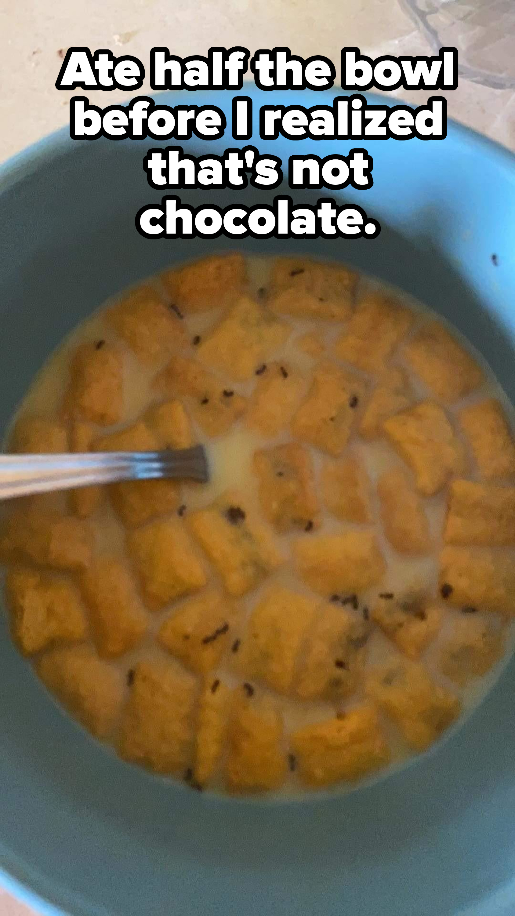 A bowl of cereal with small dark specks in it with the caption, &quot;Ate half the bowl before I realized that&#x27;s not chocolate&quot;