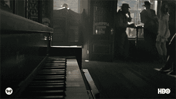 GIF of a piano playing by itself