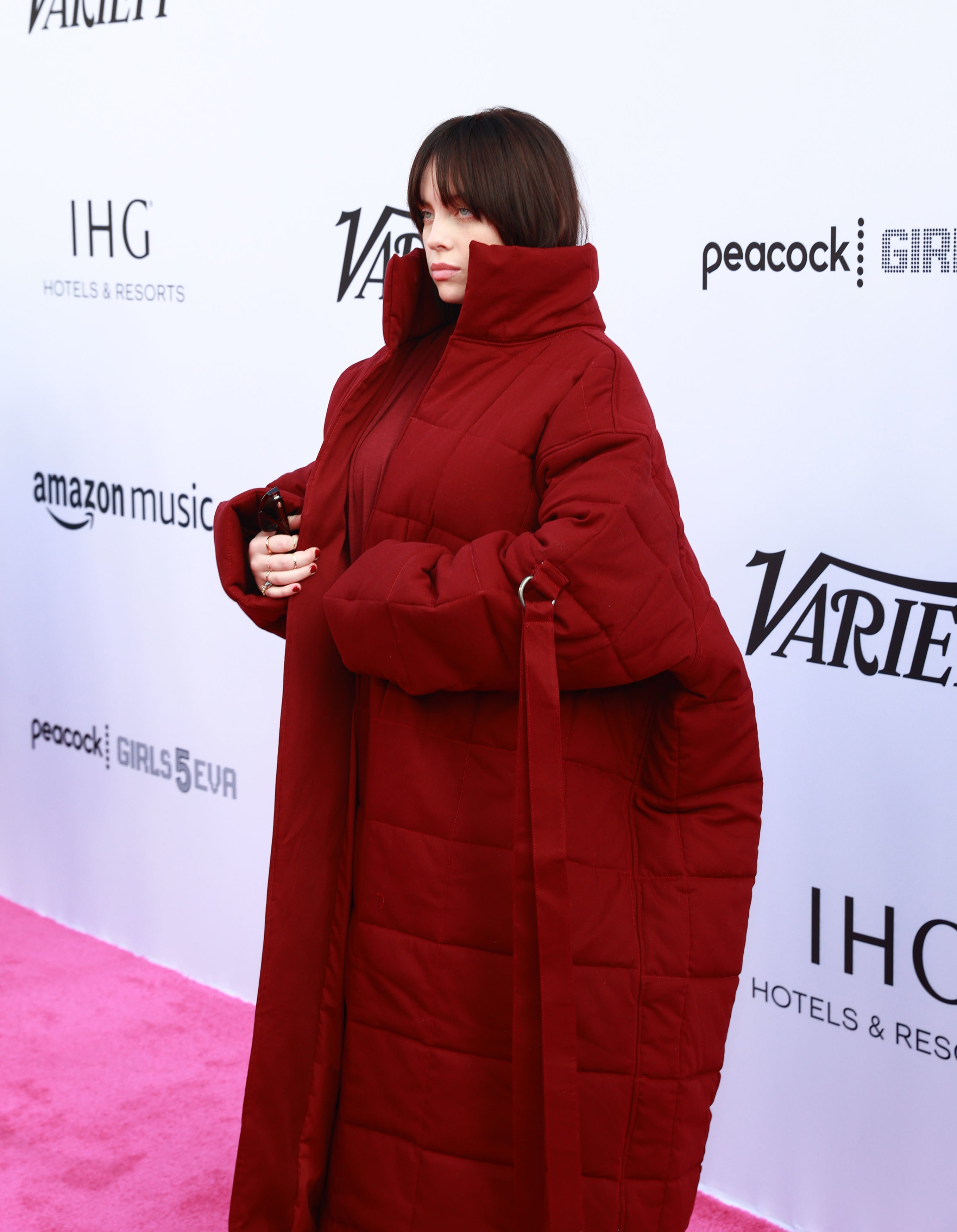 Billie on the red carpet wearing an oversized coat