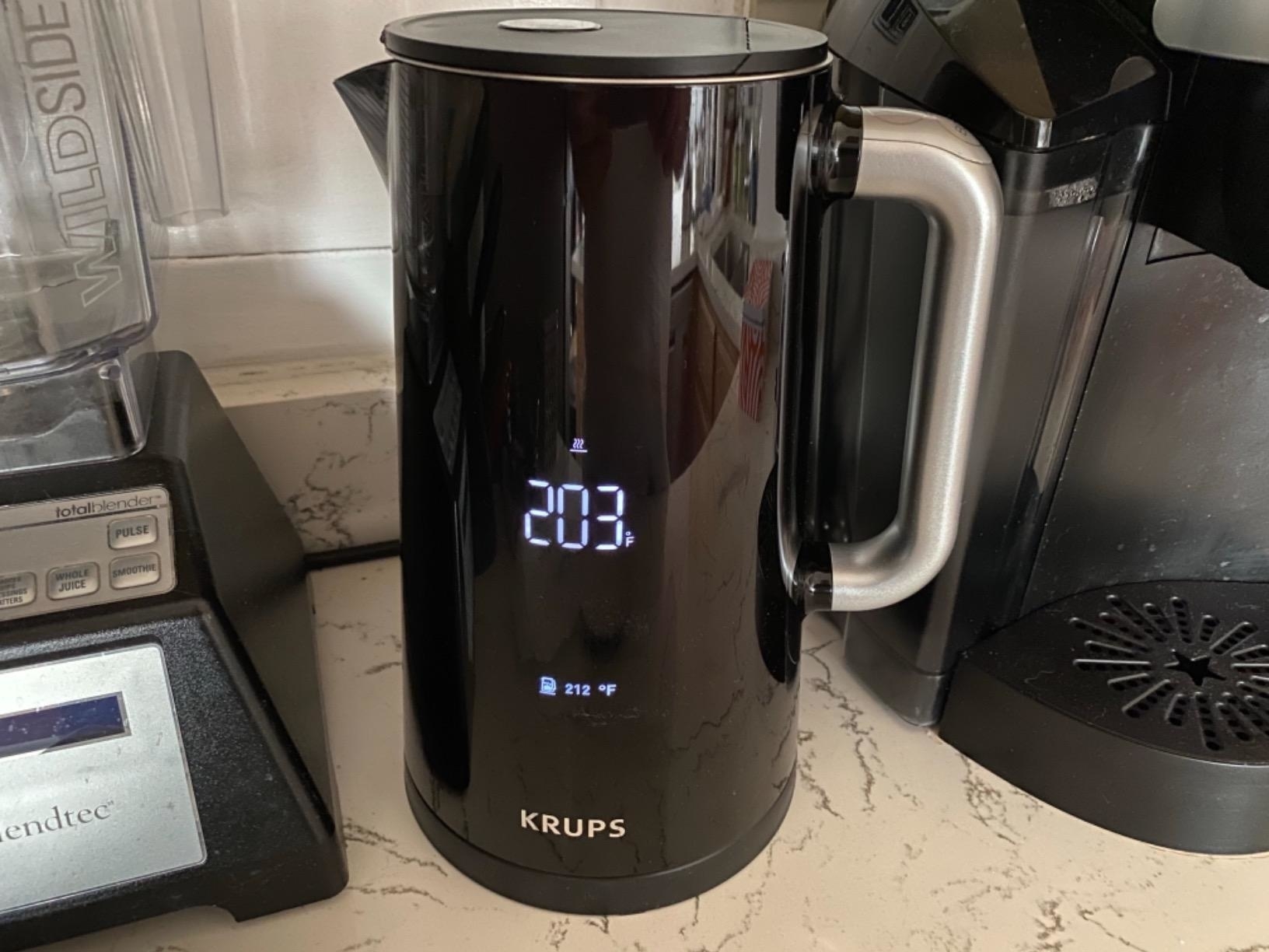 a reviewer photo of the kettle with &quot;203&quot; on the display