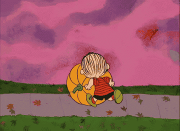 Linus van Pelt rolling a pumpkin
