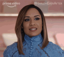 A woman sighing and putting her head down