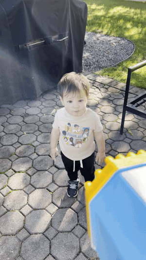 buzzfeed editor's lad   enjoying the bubble gun