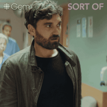 A man walking down a hospital hallway and saying, "fair"