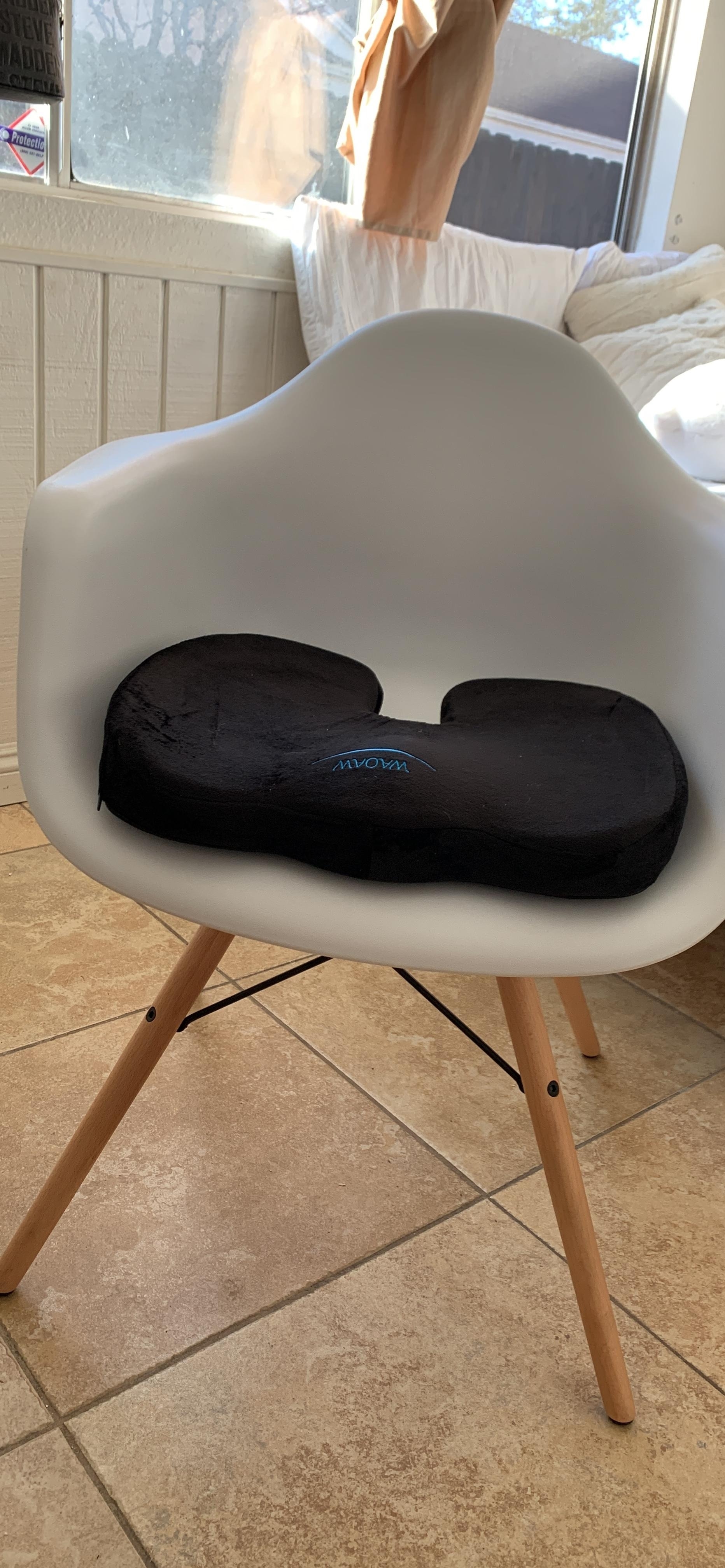 black memory foam seat cushion on white desk chair
