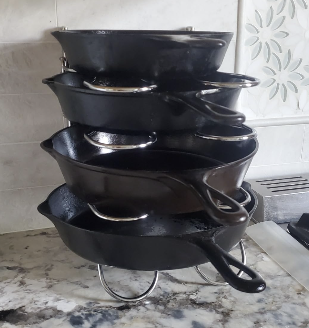 reviewer photo cast iron pans neatly stacked using the organizer