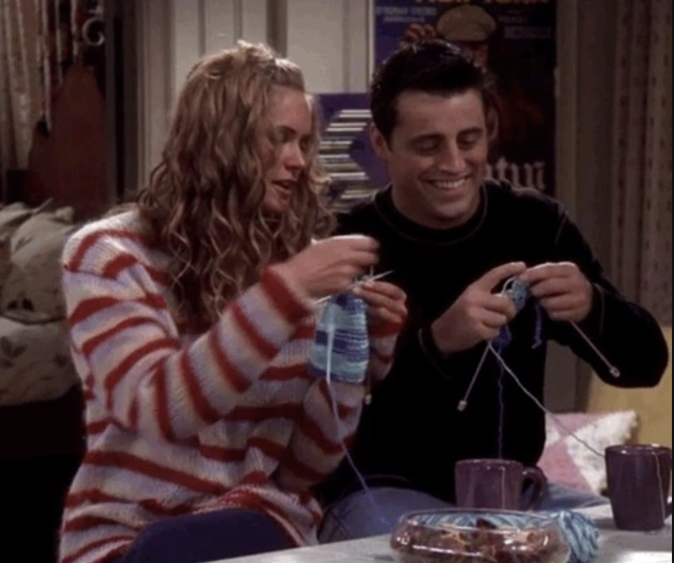man and woman knitting