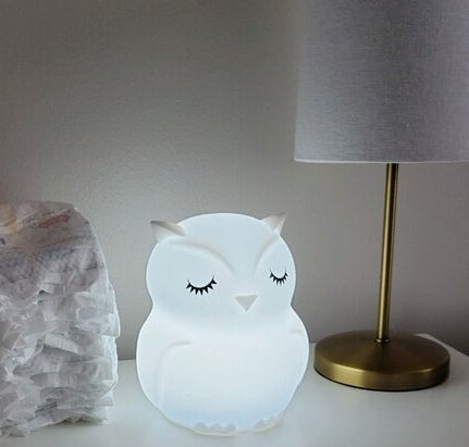 a reviewer of the white owl night-light in a nursery