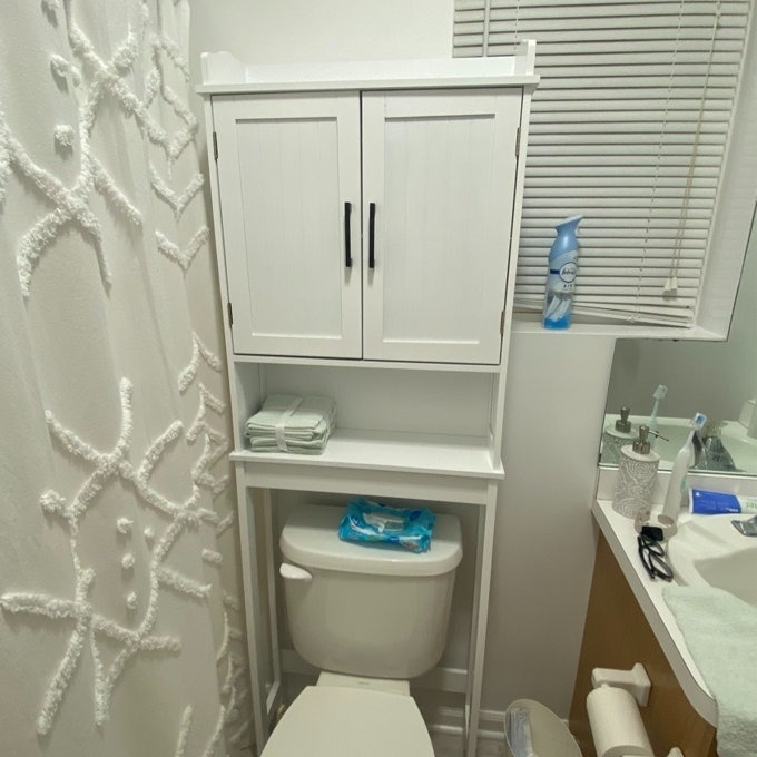 reviewer photo of the white over the toilet cabinet over the toilet