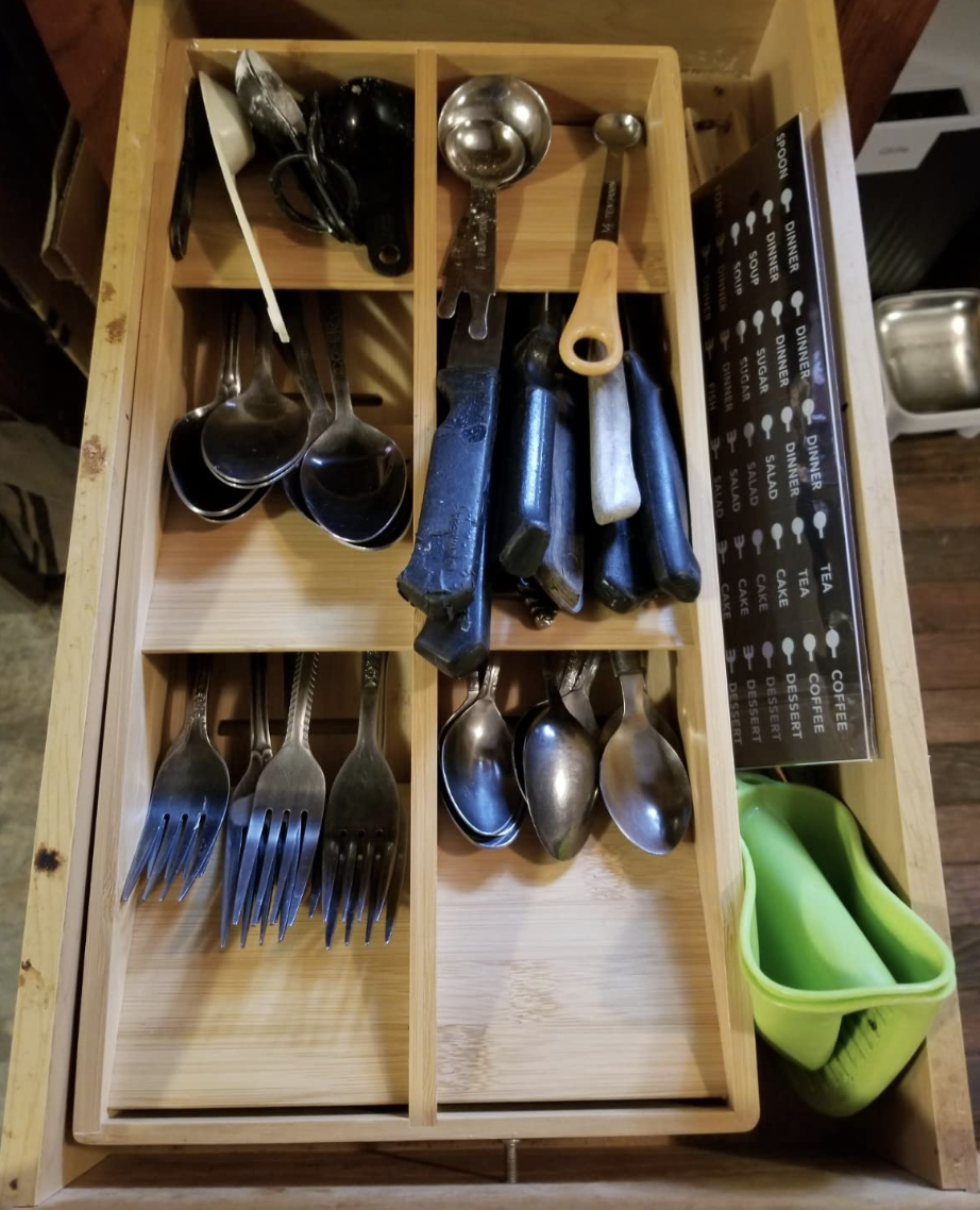 various utensils inside the cutlery drawer organizer