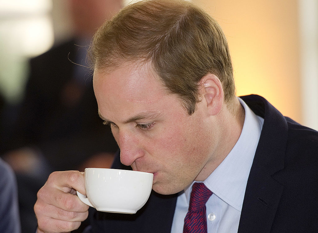 Prince William sipping tea