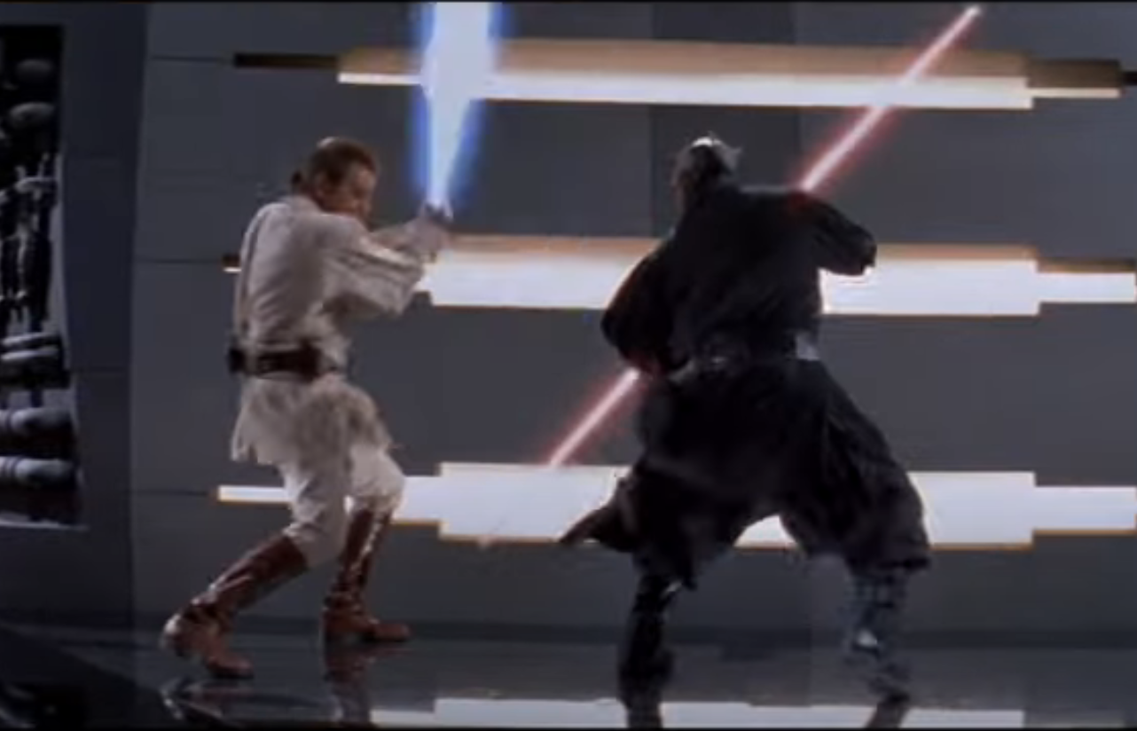 people fighting with light sabers