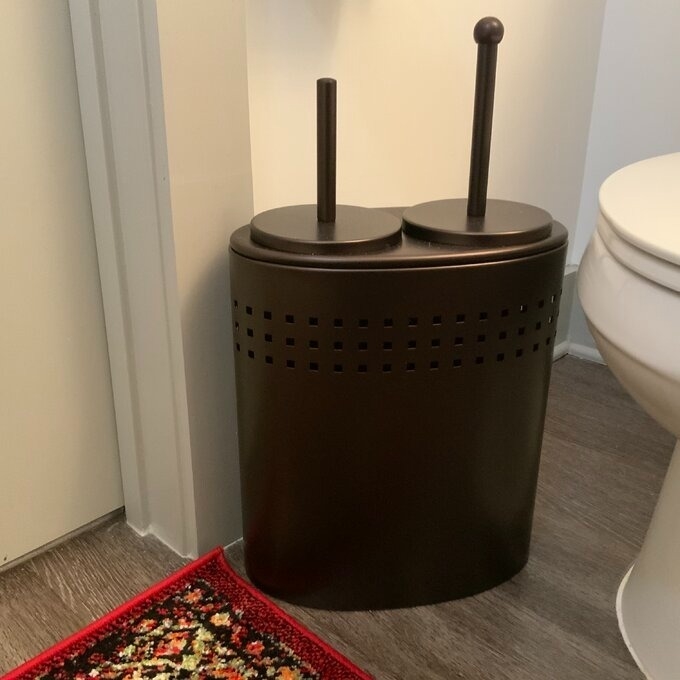 reviewer image of the espresso brown brush and plunger holder