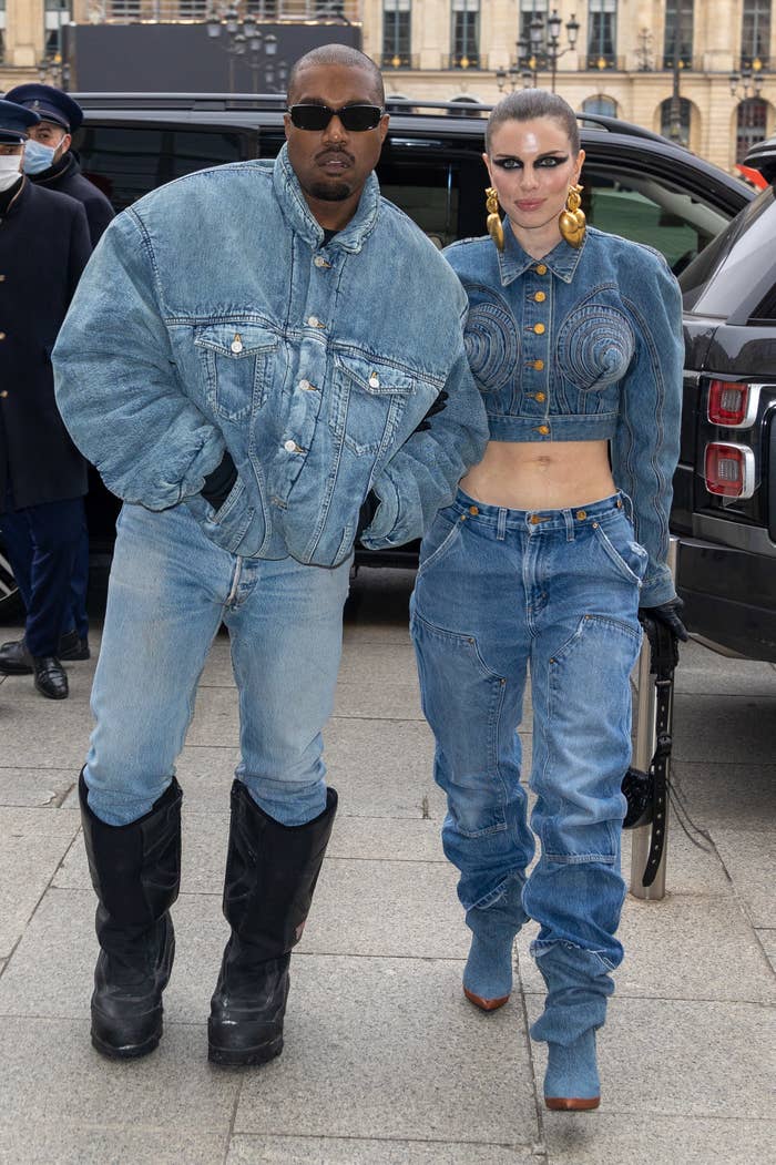 Kanye West and Julia Fox walking together, both wearing head-to-toe denim outfits