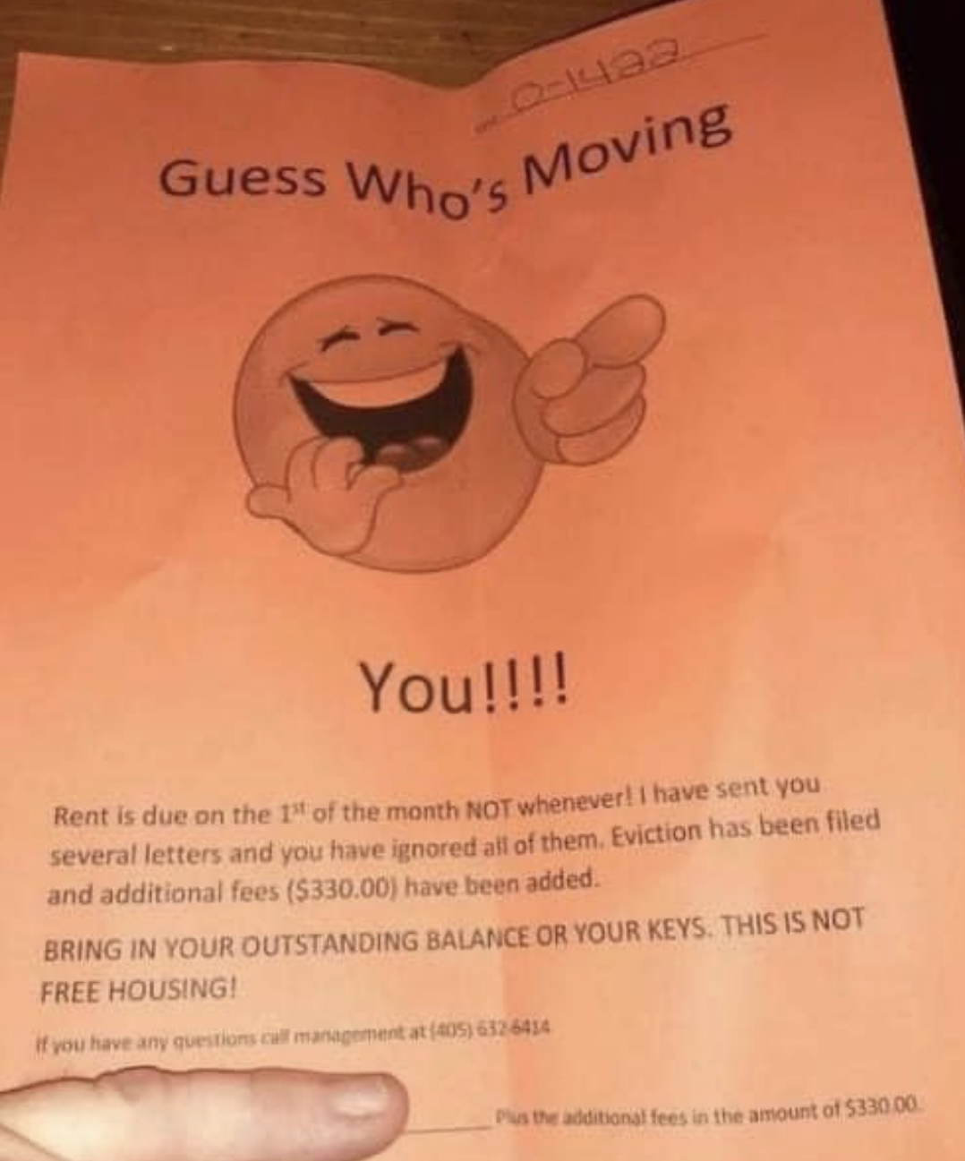 letter of eviction with a huge laughing emoji used