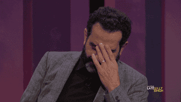 a man putting his hand over his face then his mouth