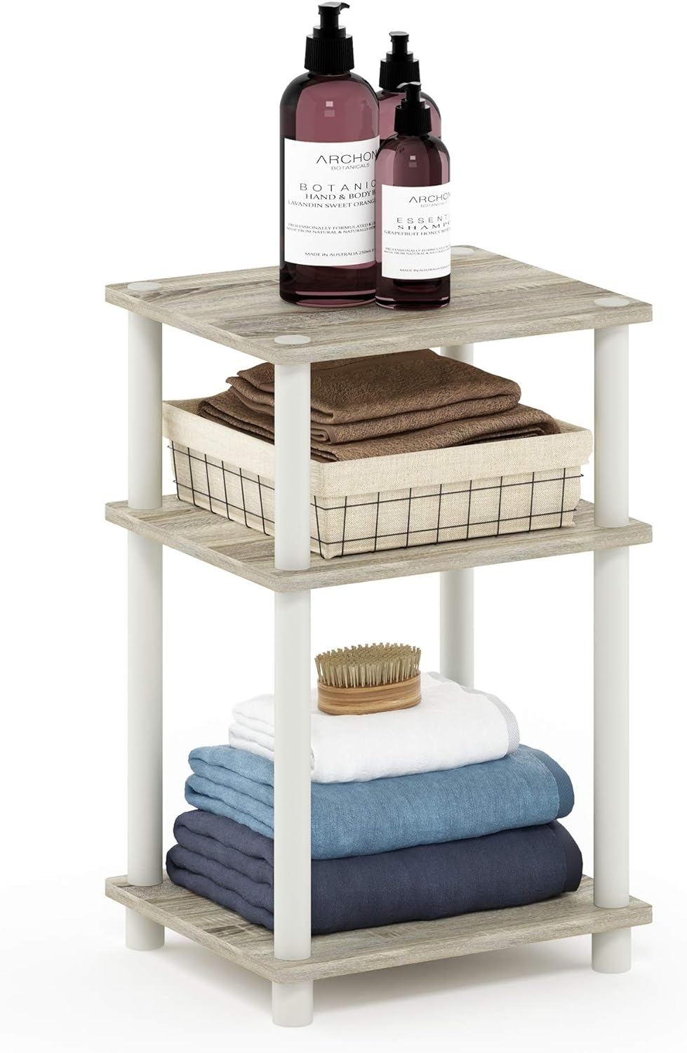 three tier shelf with towels on shelves