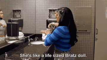a woman saying, "she's like a life sized Bratz doll"