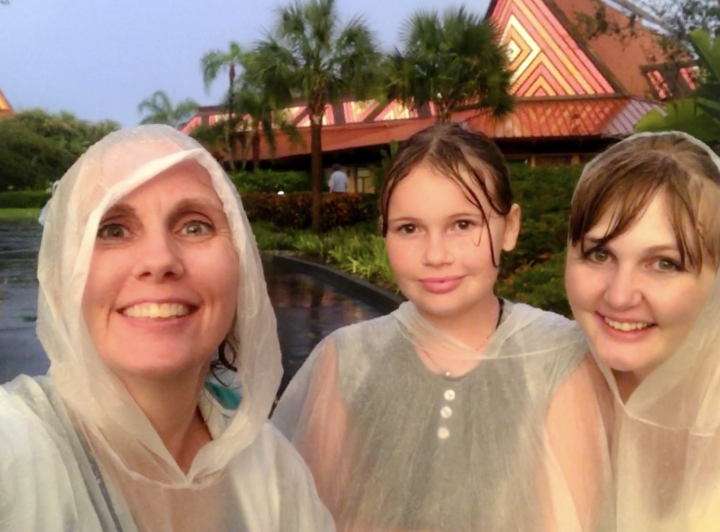 The author taking a rained-on selfie with others