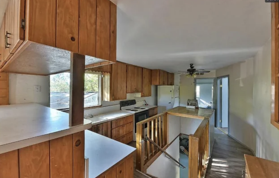 staircase in the middle of the kitchen