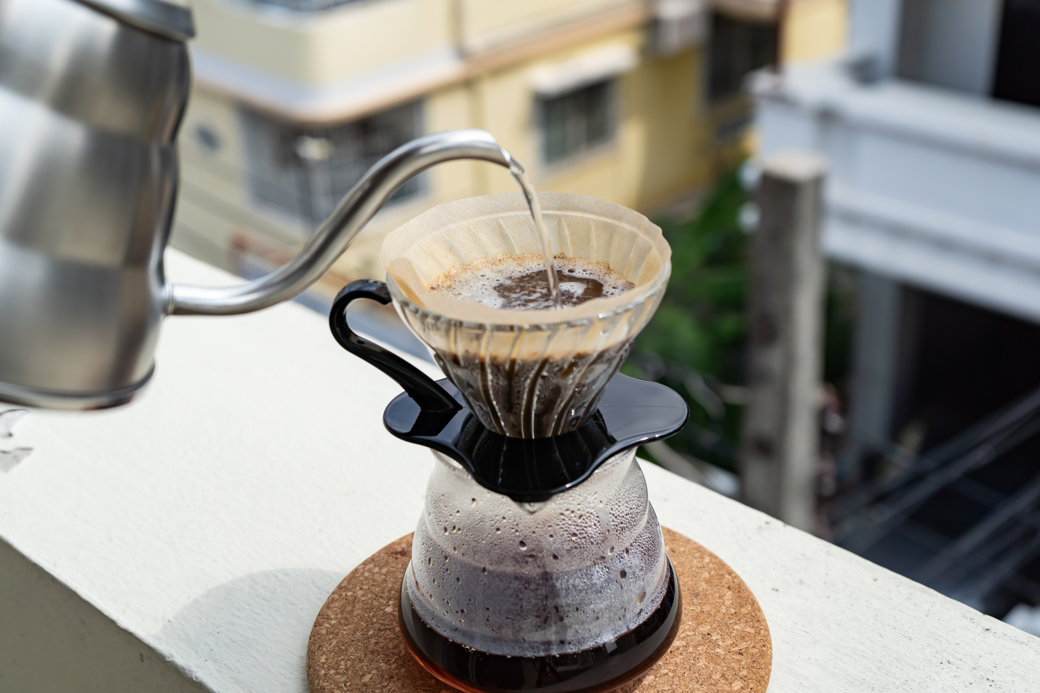 Someone making pour-over coffee