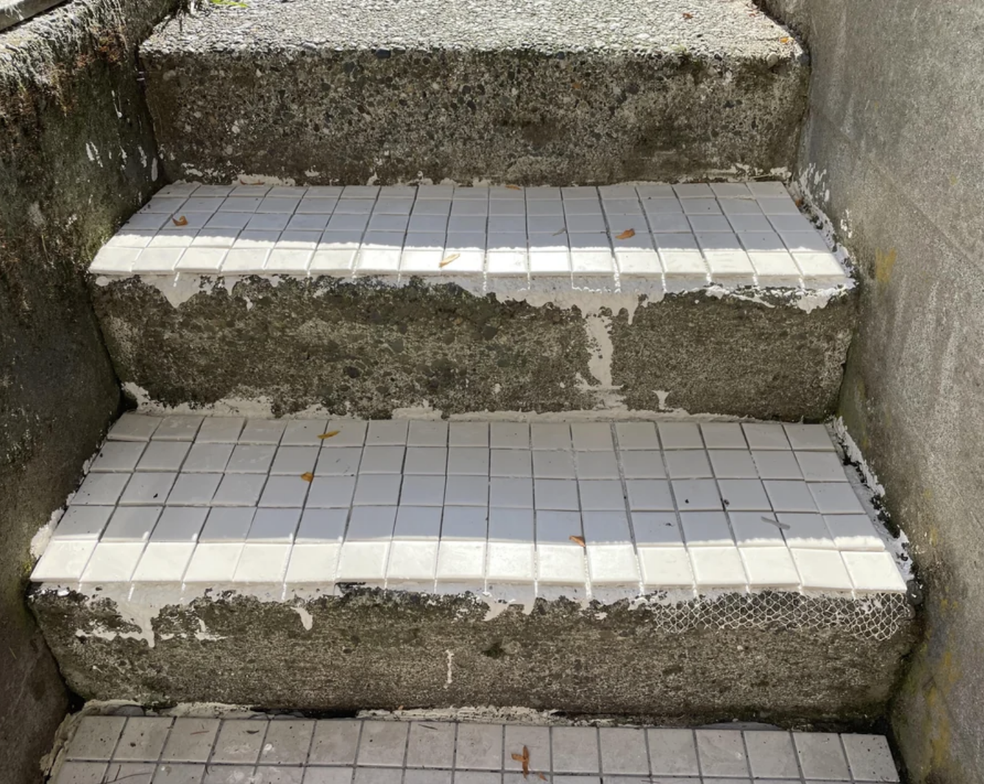 stairs with janky tiles