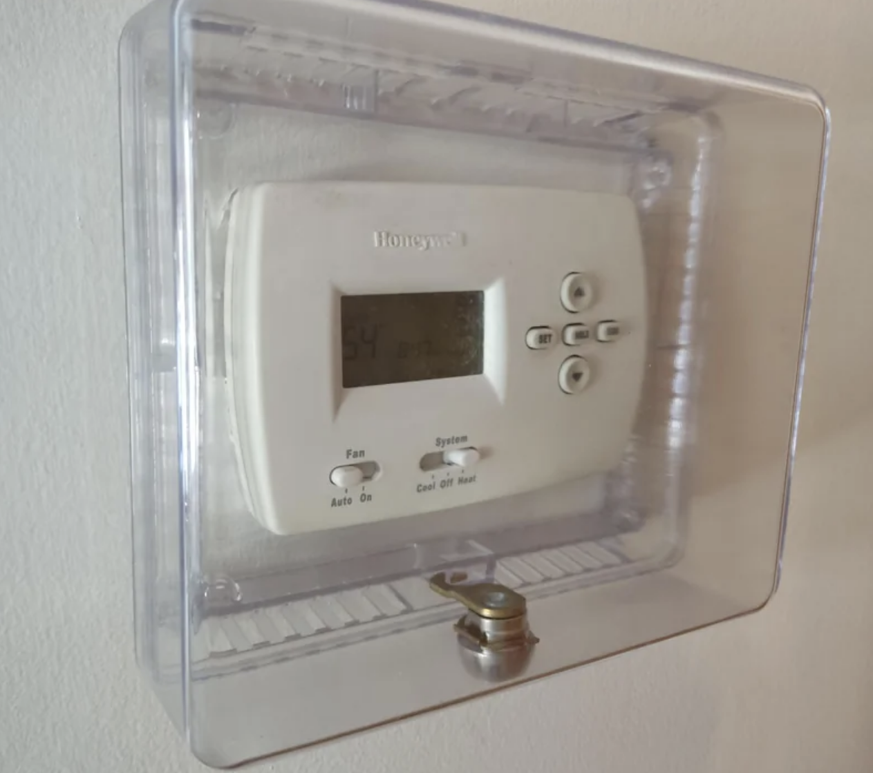a locked box around the thermostat