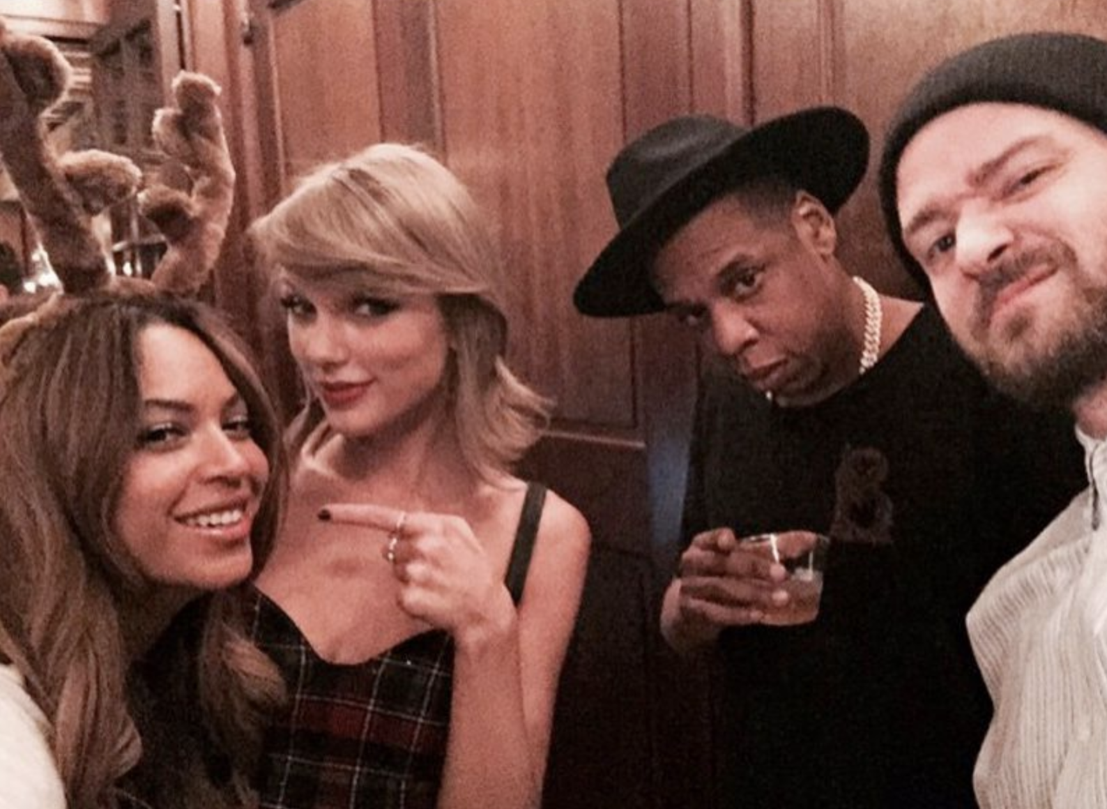 Closeup of Beyoncé, Taylor, and Jay-Z with Justin Timberlake