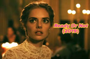 Girl in a wedding dress with wide eyes and a slightly open mouth as if scared. This is a screenshot from the 2019 film, "Ready or Not"