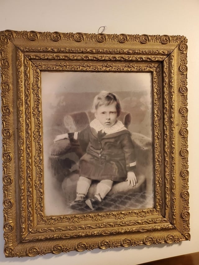 An old-time painting of a child